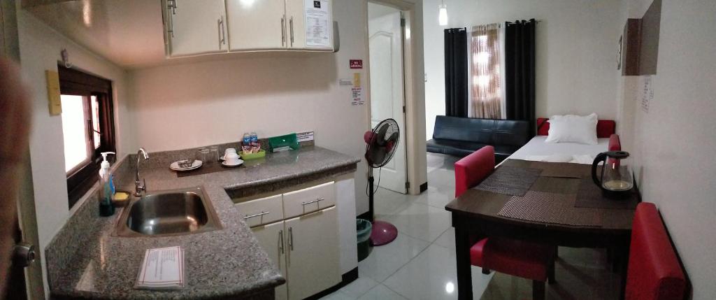 Postel nebo postele na pokoji v ubytování V.F. Riton Apartelle