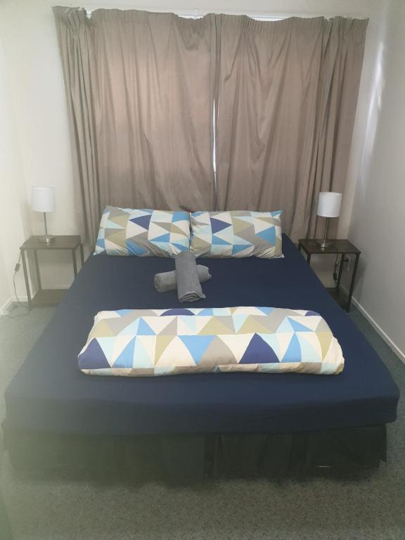 Postel nebo postele na pokoji v ubytování Backpackers Central Hamilton