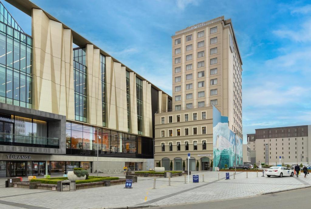 a rendering of a building in a city at Novotel Christchurch Cathedral Square in Christchurch