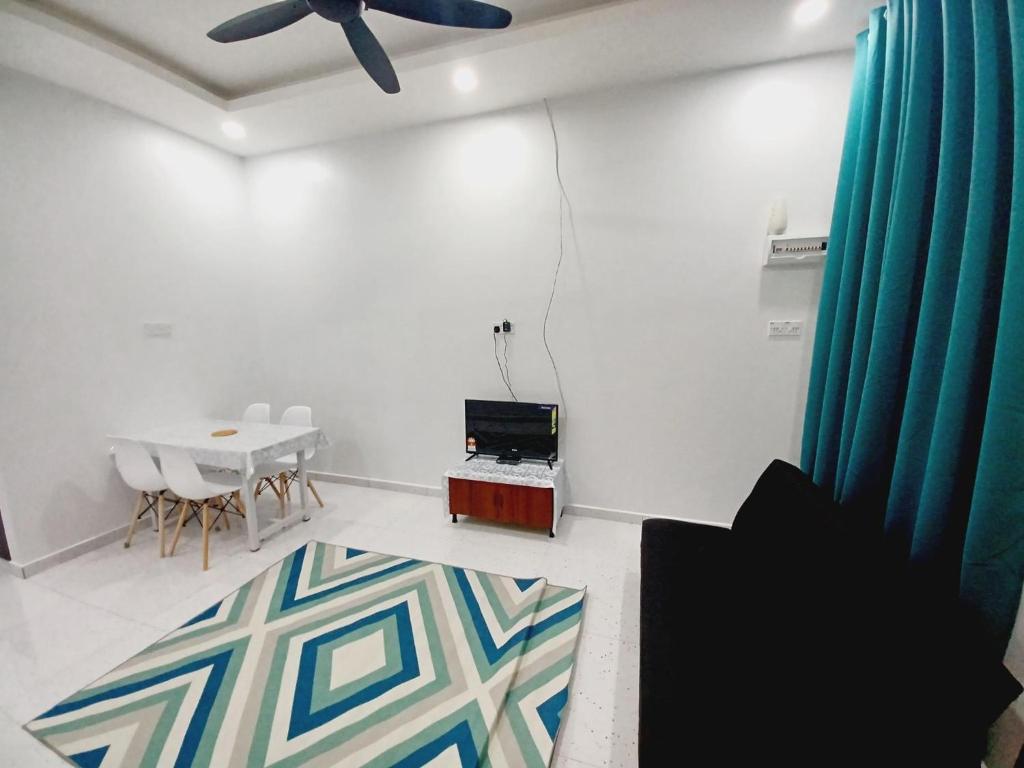 TV a/nebo společenská místnost v ubytování Aufa House