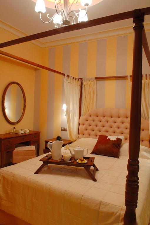 Posteľ alebo postele v izbe v ubytovaní Olympic Fashion Hotels
