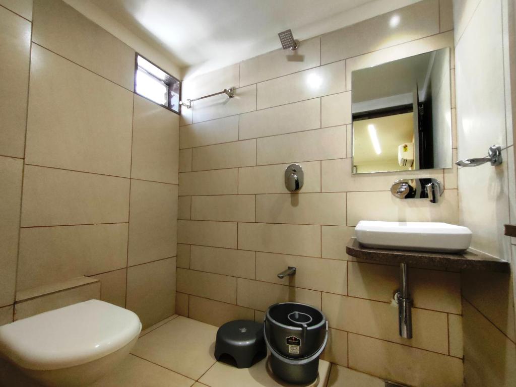 Koupelna v ubytování Hotel Kinara