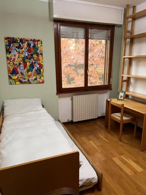 Postel nebo postele na pokoji v ubytování Casa Carlotta - Milan Expo