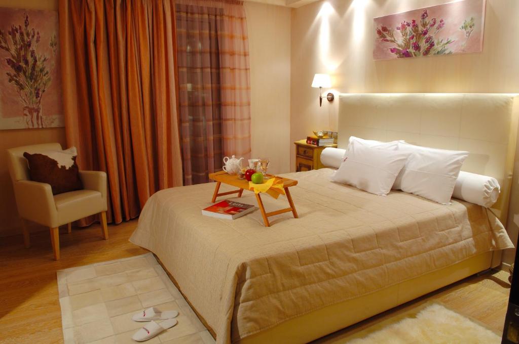 Posteľ alebo postele v izbe v ubytovaní Olympic Fashion Hotels