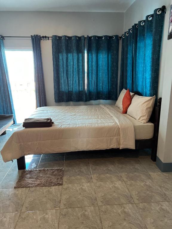 Postel nebo postele na pokoji v ubytování Nare Guest House