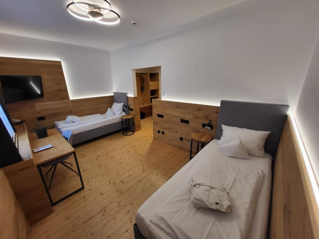 Postel nebo postele na pokoji v ubytování Witikohof