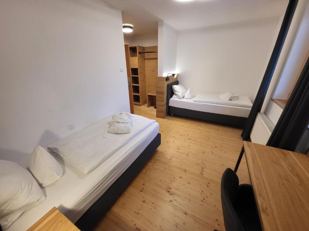 Postel nebo postele na pokoji v ubytování Witikohof
