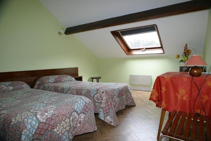 Postel nebo postele na pokoji v ubytování Garabit Hotel