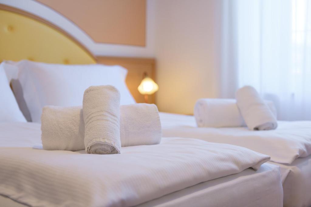 Postel nebo postele na pokoji v ubytování Hotel Antico Monastero