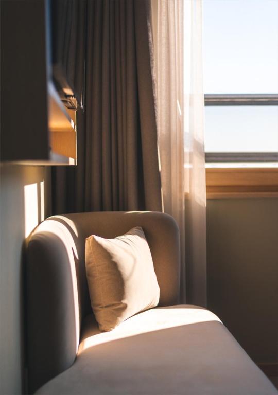 Nampo Ocean2Heaven Hotel& Spa房間的床