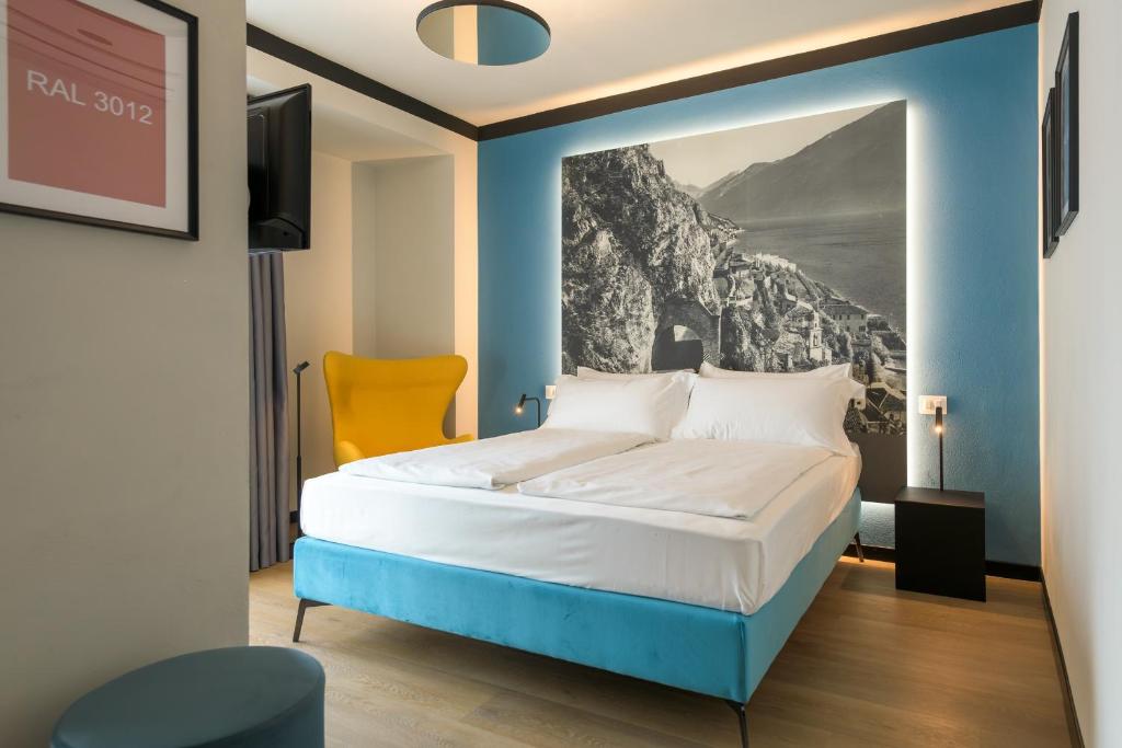 Łóżko lub łóżka w pokoju w obiekcie Hotel Villa Dirce