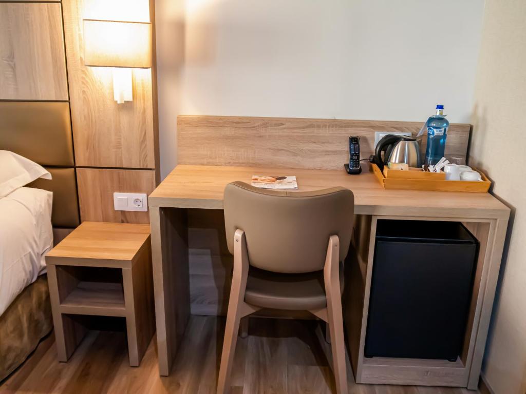 Postel nebo postele na pokoji v ubytování Hotel Princesa Parc
