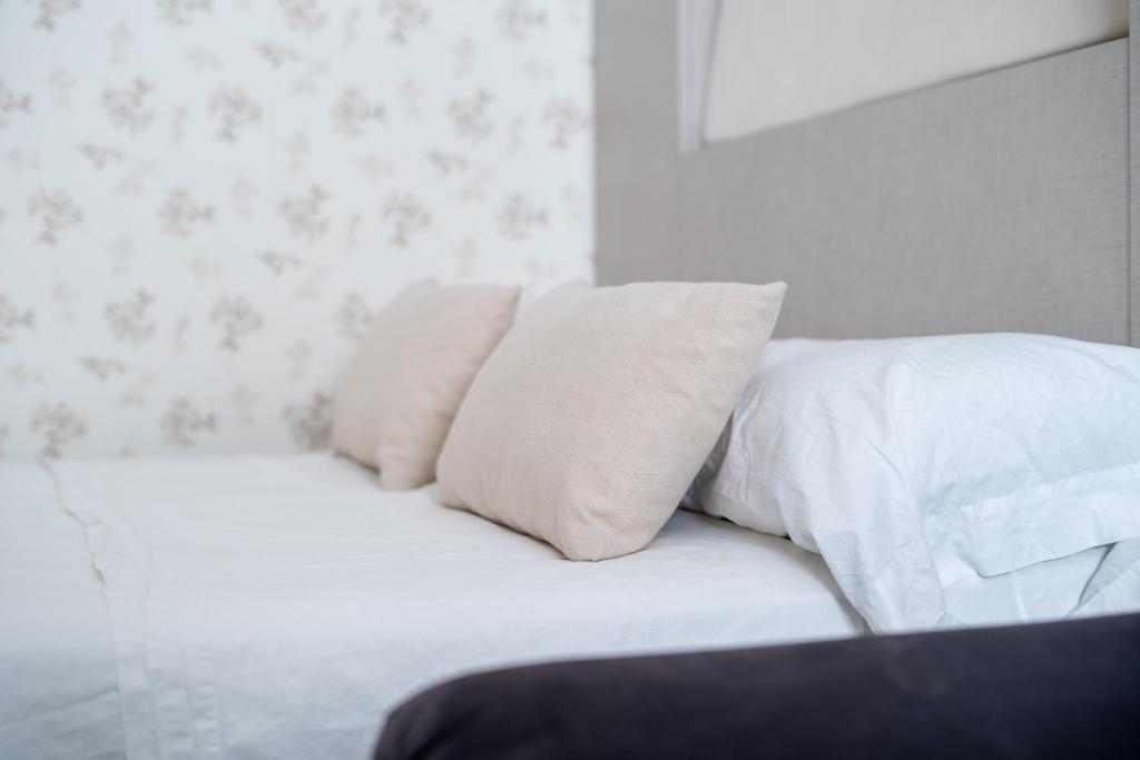 A bed or beds in a room at Apartamento moderno en el centro de Granada - Mititilla