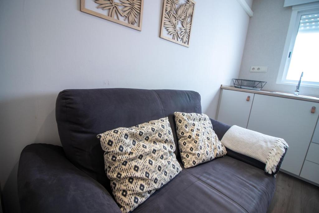 A seating area at Apartamento moderno en el centro de Granada - Mititilla