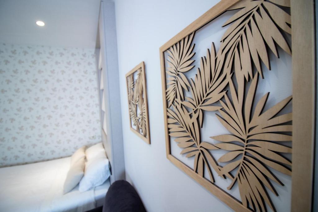 A bed or beds in a room at Apartamento moderno en el centro de Granada - Mititilla