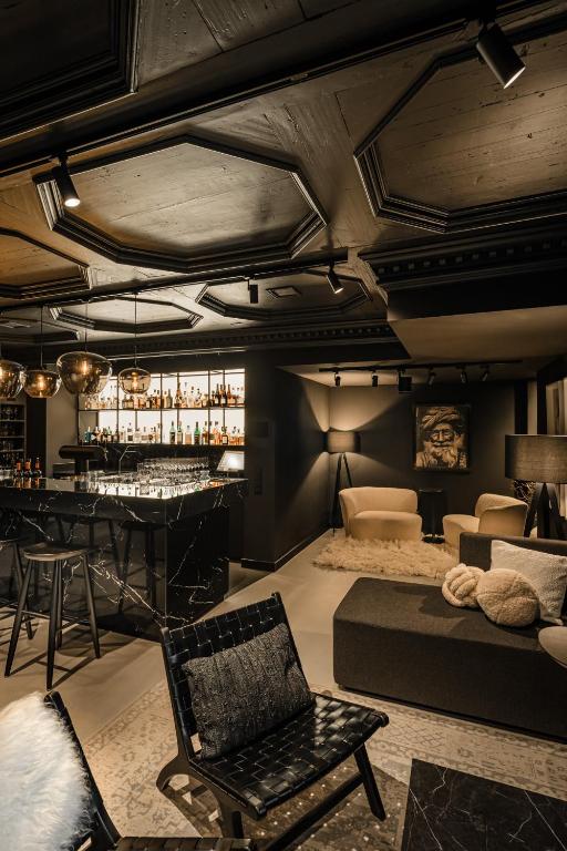 Ein Sitzbereich in der Unterkunft Hotel Riesengebirge