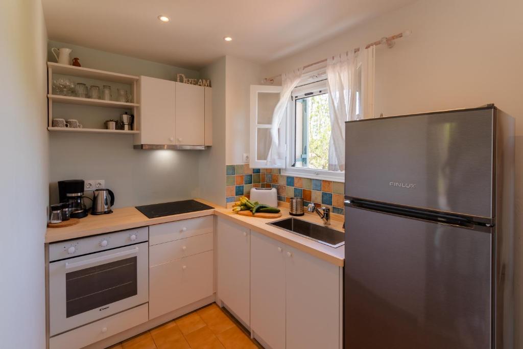 Kuchyň nebo kuchyňský kout v ubytování Kapella Apartments