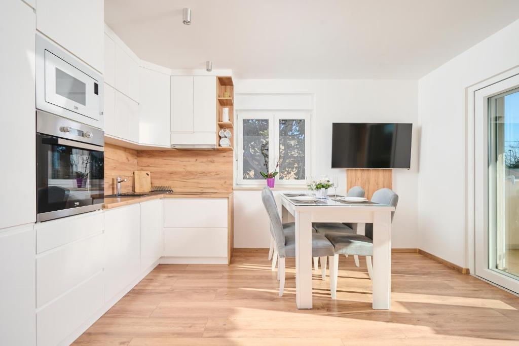 Kuchyň nebo kuchyňský kout v ubytování Apartma Morje