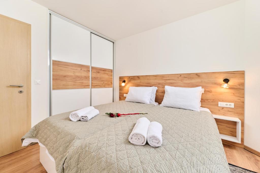Postel nebo postele na pokoji v ubytování Apartma Morje