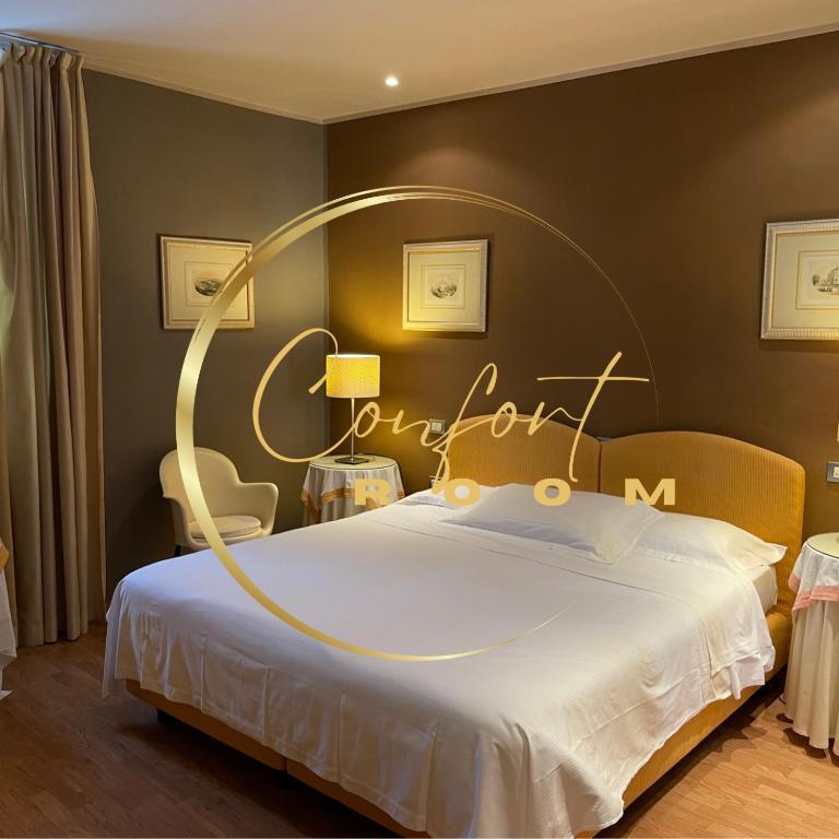 Postel nebo postele na pokoji v ubytování Albergo Ristorante Trieste Boves