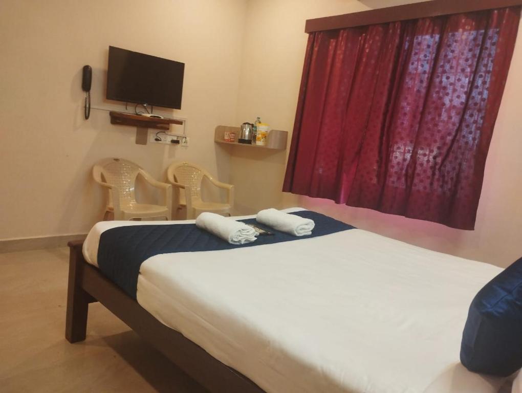 Postel nebo postele na pokoji v ubytování Grand Ocean inn