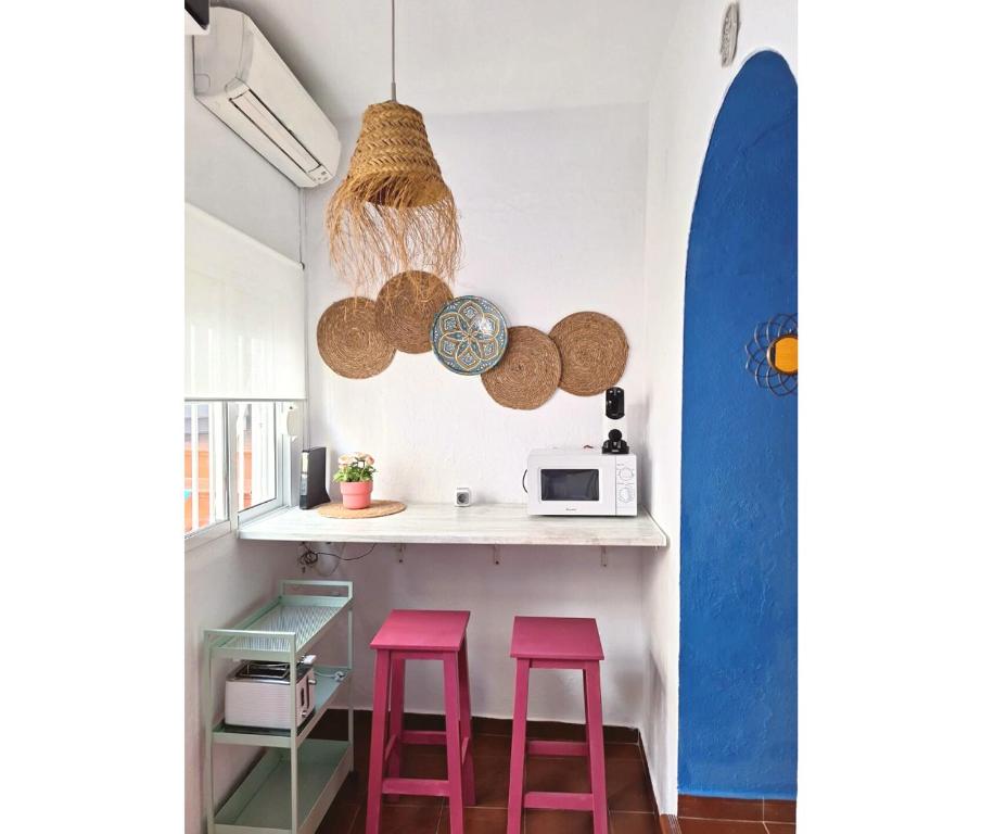 Kuchyňa alebo kuchynka v ubytovaní Apartamentos La Casa del Remolino- Centro histórico de Conil, andando a la playa