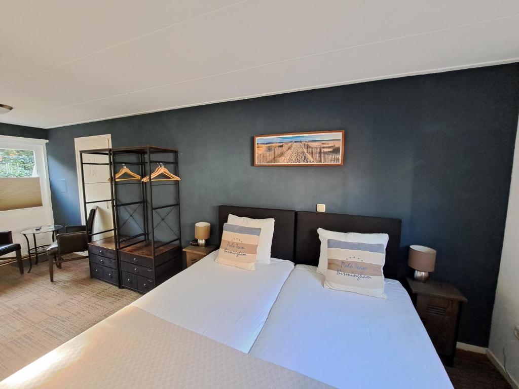 Postel nebo postele na pokoji v ubytování Hotel Randduin