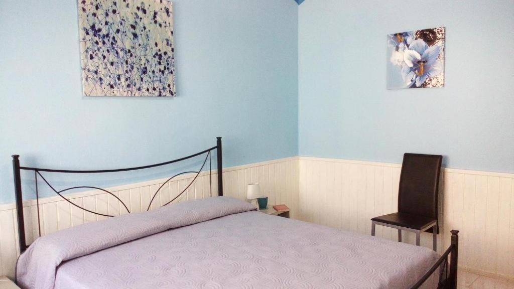 Postel nebo postele na pokoji v ubytování Etna little Home