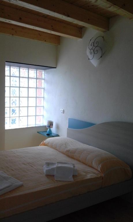 Postel nebo postele na pokoji v ubytování Albergo Caprile