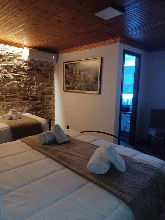 Postel nebo postele na pokoji v ubytování Guest House Hasko