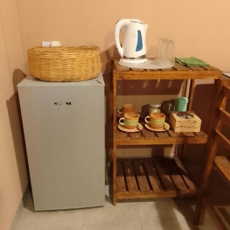 Kuchyň nebo kuchyňský kout v ubytování El Aromito Hospedaje