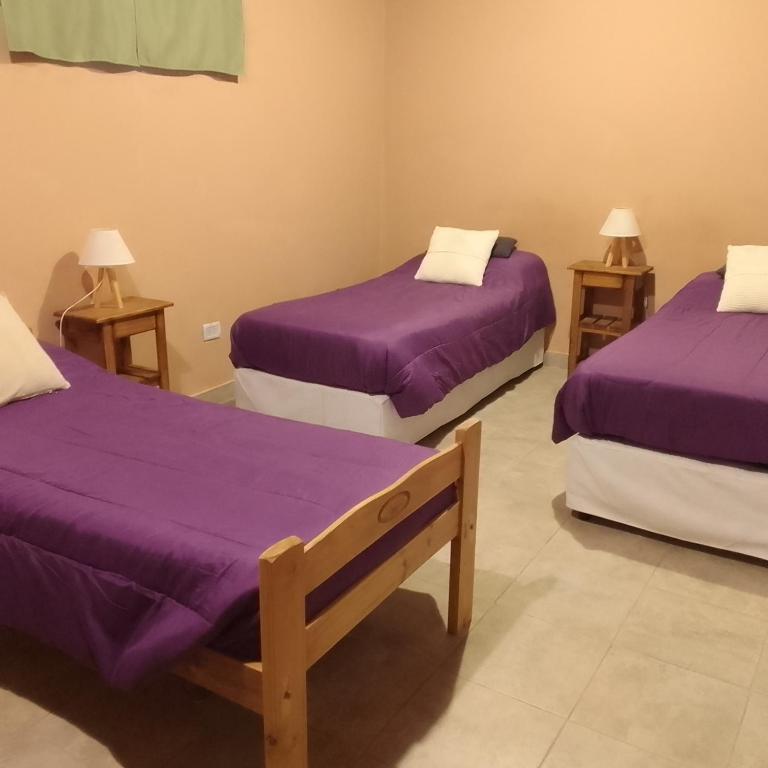 Postel nebo postele na pokoji v ubytování El Aromito Hospedaje