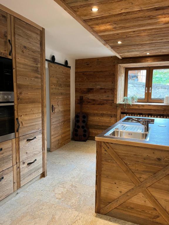 Kuchyň nebo kuchyňský kout v ubytování Chalet Paula
