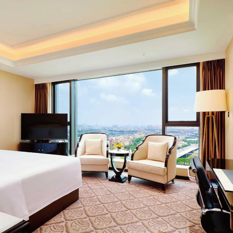 TV a/nebo společenská místnost v ubytování The Yun Hotel Foshan Nanhai-Near Pazhou Complex