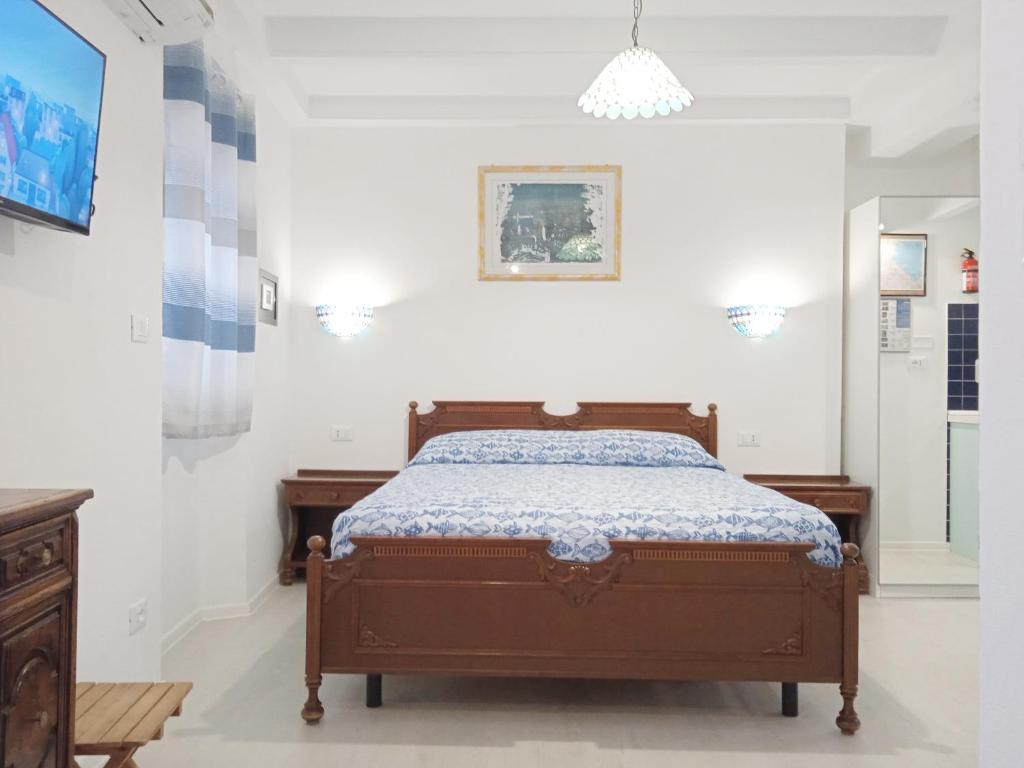 Lova arba lovos apgyvendinimo įstaigoje La casa di Uccia