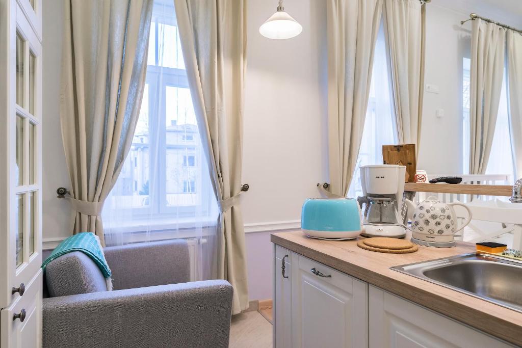 Kuchyň nebo kuchyňský kout v ubytování Revelton Suites Tallinn
