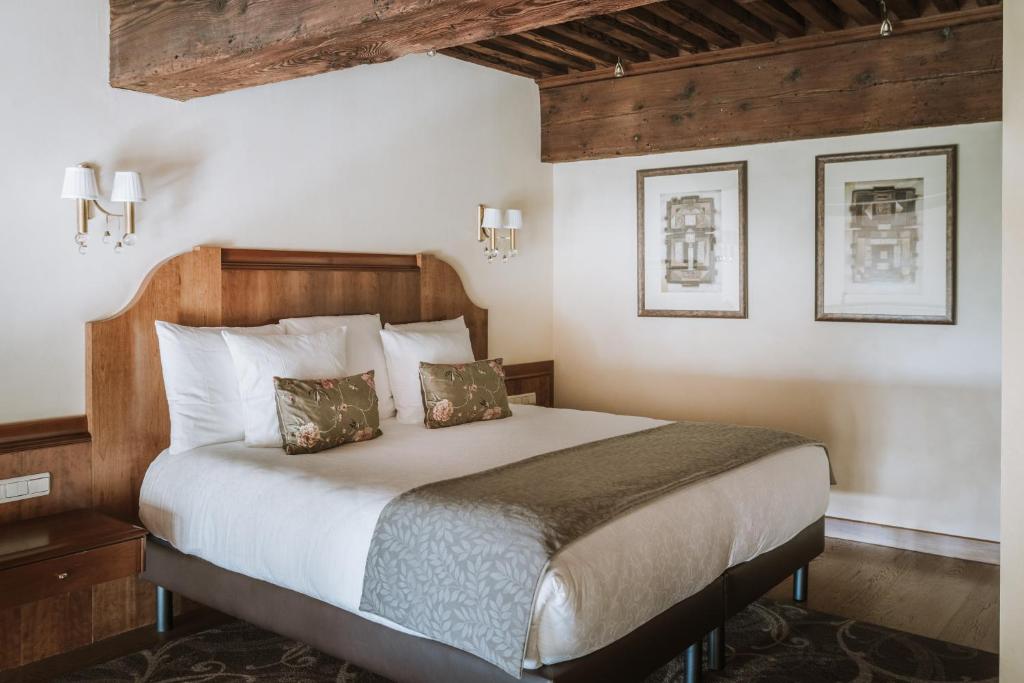 Postel nebo postele na pokoji v ubytování Villa Florentine