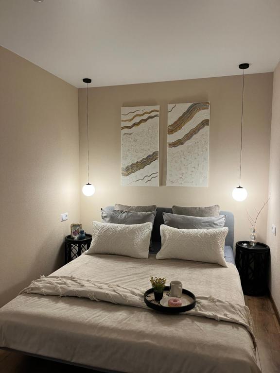 Postel nebo postele na pokoji v ubytování New Charm Apartments near Border