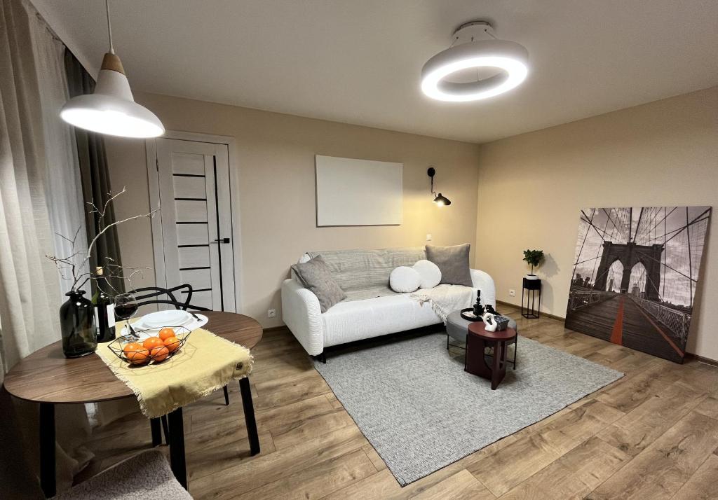 Posezení v ubytování New Charm Apartments near Border
