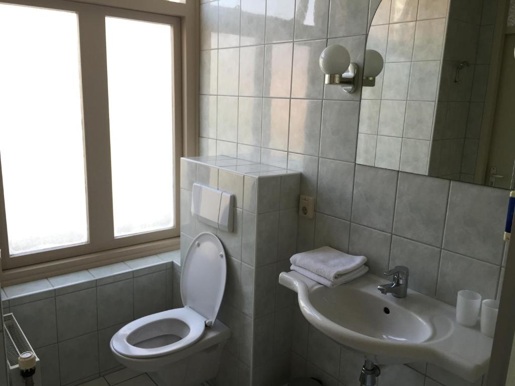 Koupelna v ubytování Hotel van Oppen