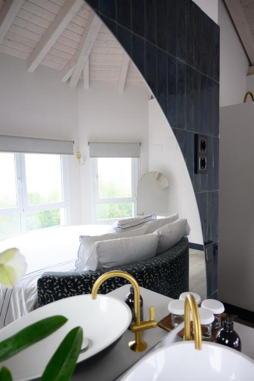 Postel nebo postele na pokoji v ubytování Neguetxea Boutique Guest House