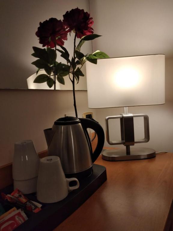 Příslušenství pro přípravu čaje a kávy v ubytování Hotel Principe Eugenio