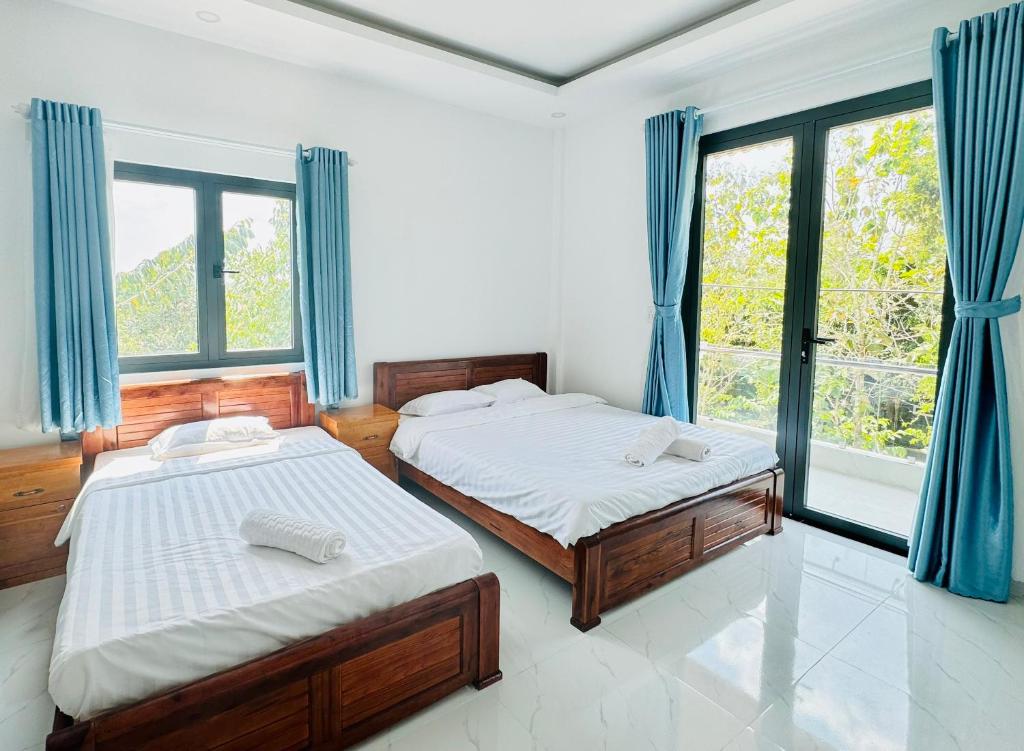 Lava Rock Viet Nam Lodge Anhfly Resort Nam Cát Tiên - 阳台的家庭房