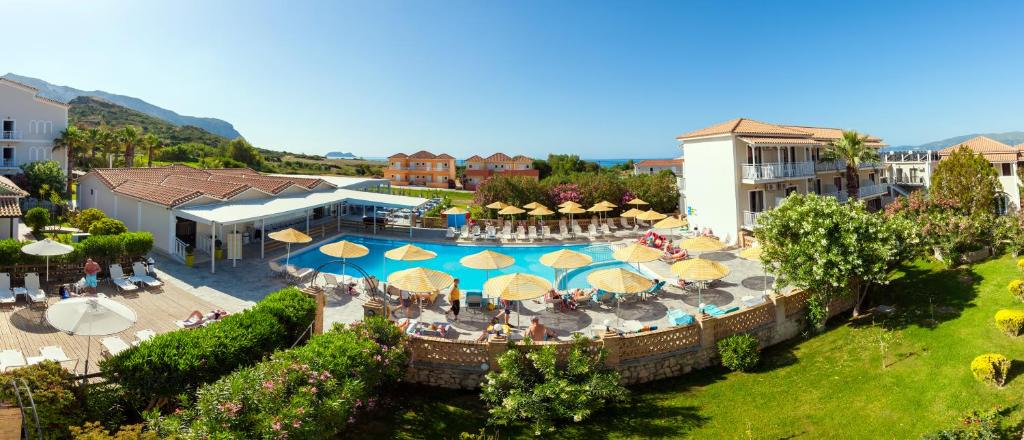 an aerial view of a resort with a swimming pool at Cavo D'oro Resort in Kalamaki