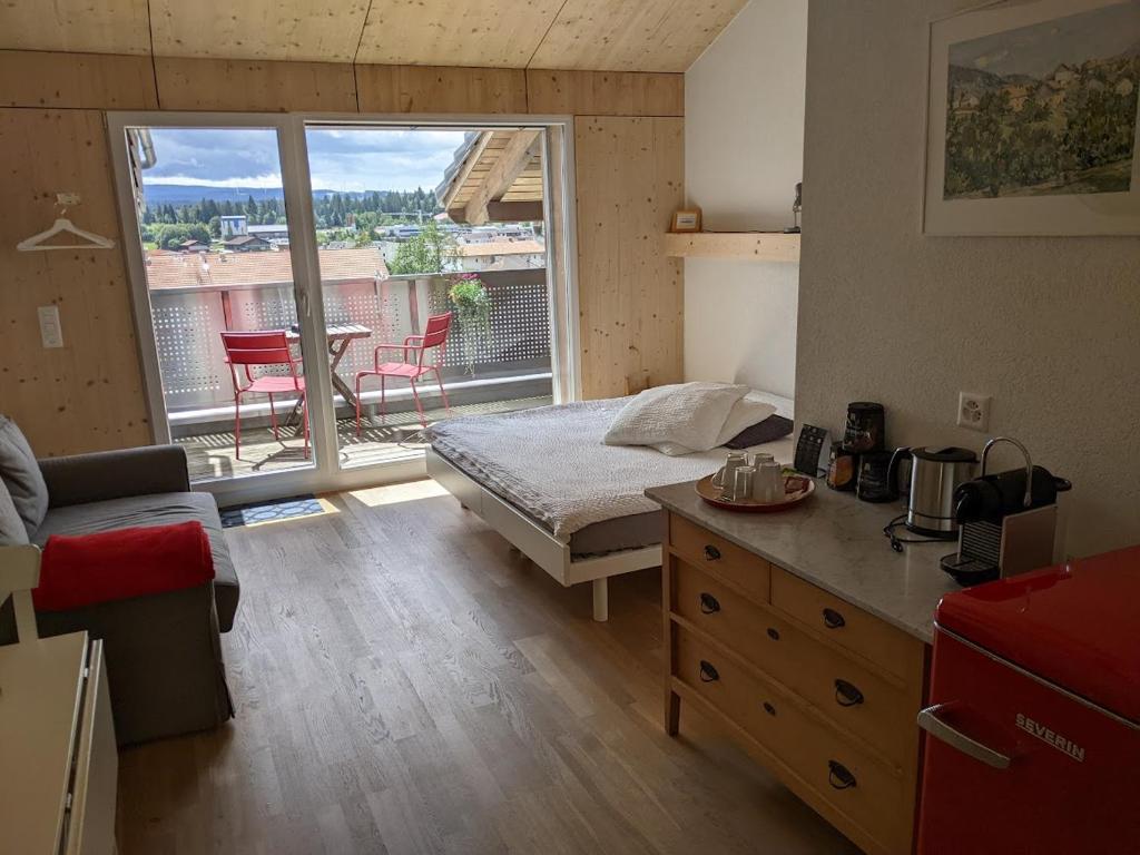 Postel nebo postele na pokoji v ubytování Gîte Chez Toinette