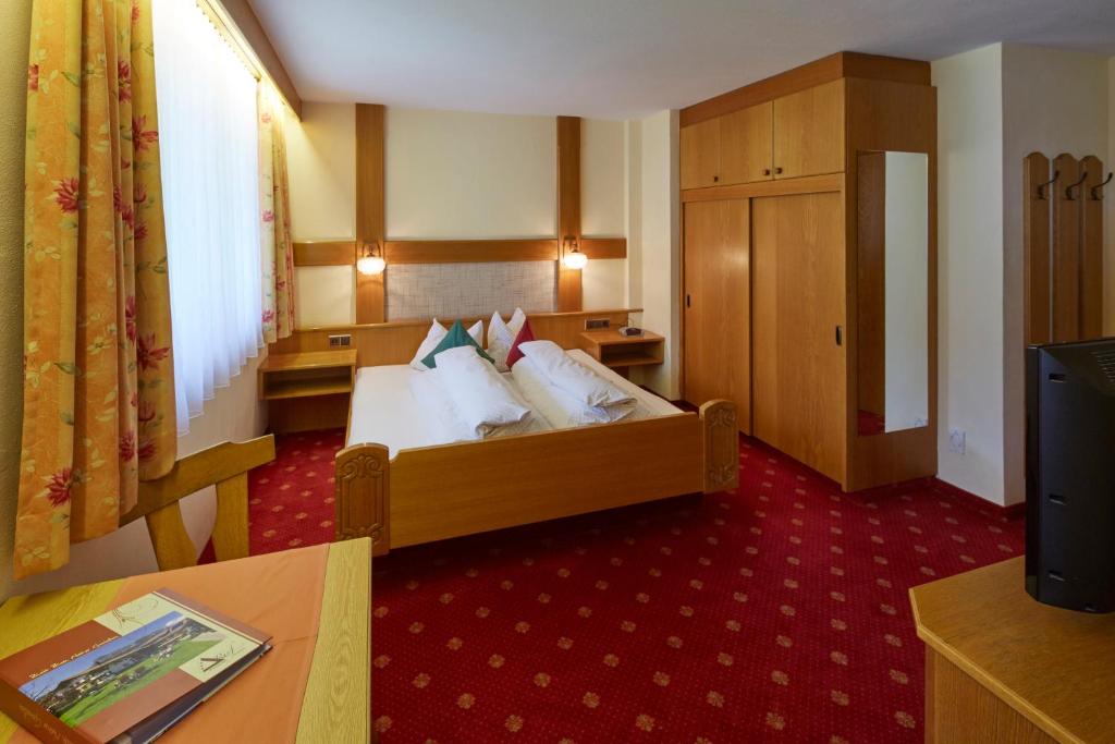Posteľ alebo postele v izbe v ubytovaní Das Apartment Rief daheim beim Wanderprofi Adults Only