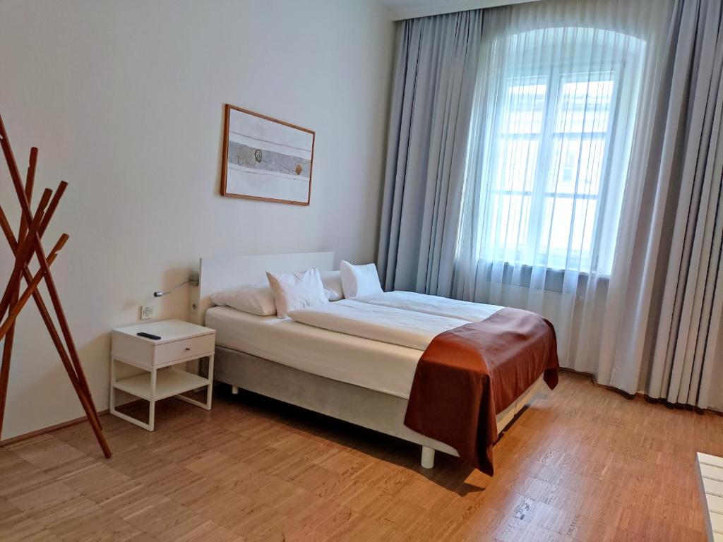 Voodi või voodid majutusasutuse Hotel Am Domplatz - Adult Only toas