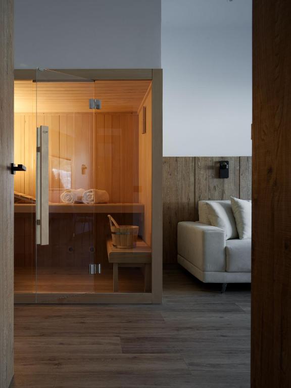 a living room with a couch and a table at Cervino - VRetreats in Breuil-Cervinia