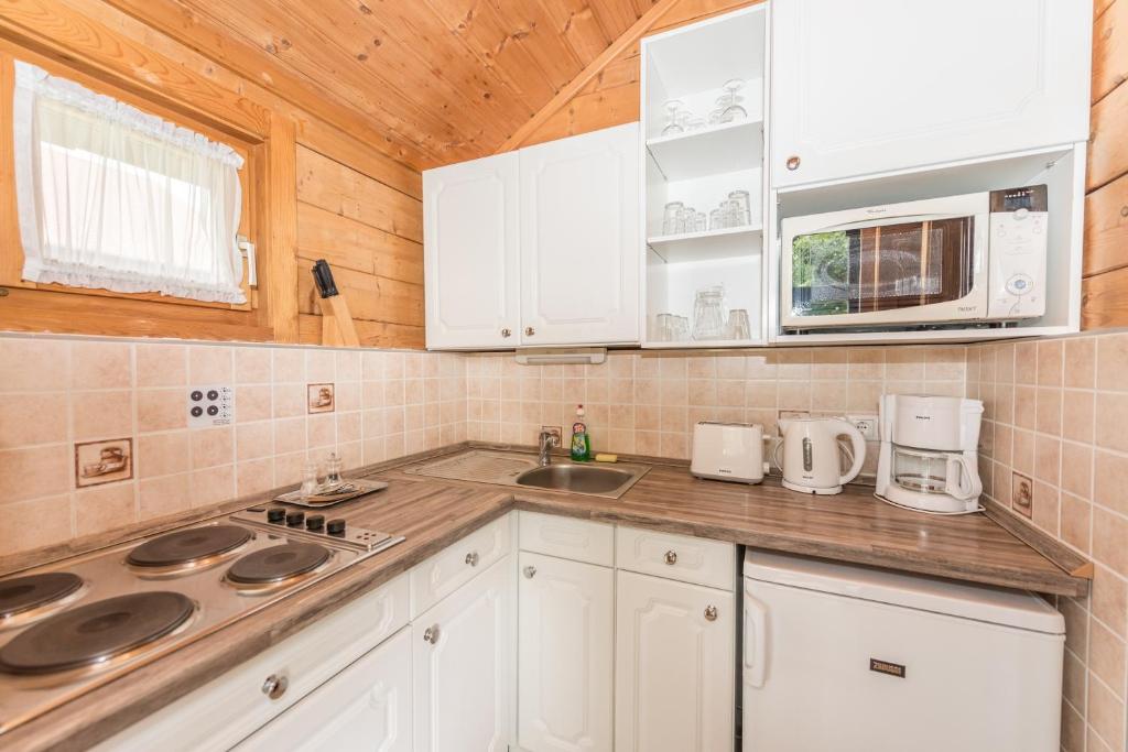 Kuchyň nebo kuchyňský kout v ubytování Petneházy Aparthotel