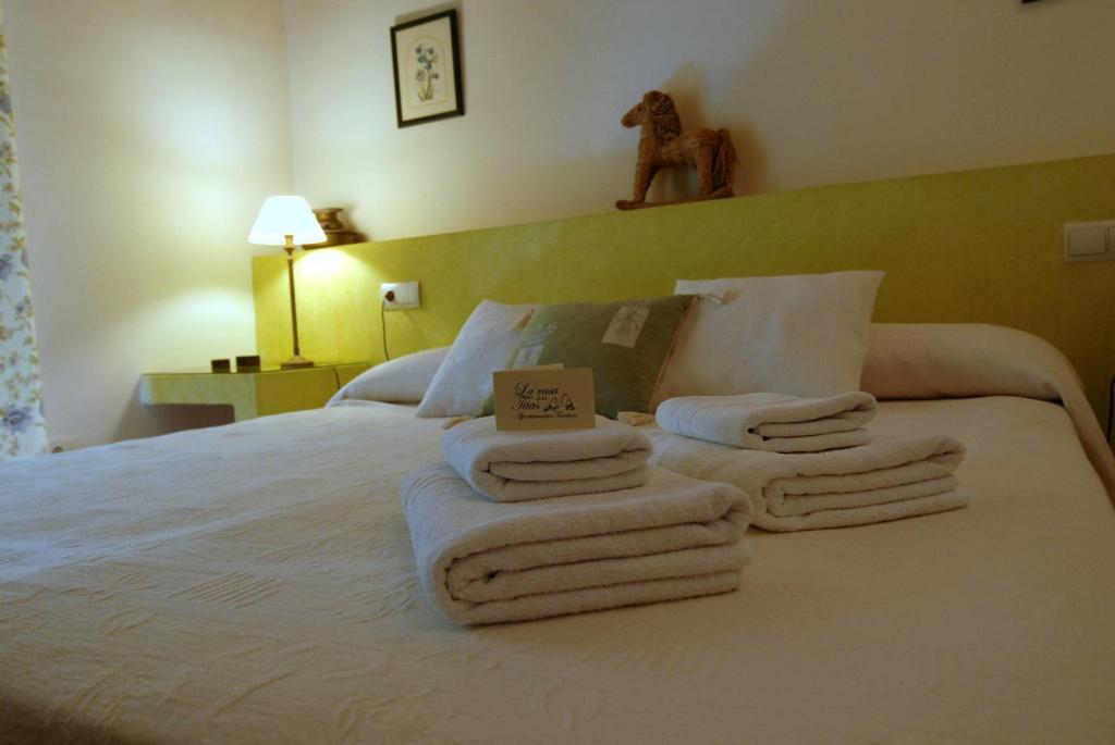 Postel nebo postele na pokoji v ubytování La Casa de Las Titas